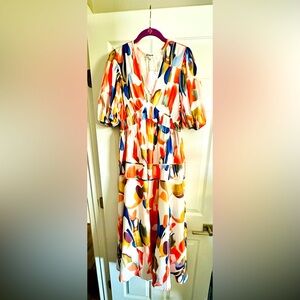 A bohemian-inspired size large multi-color dress.